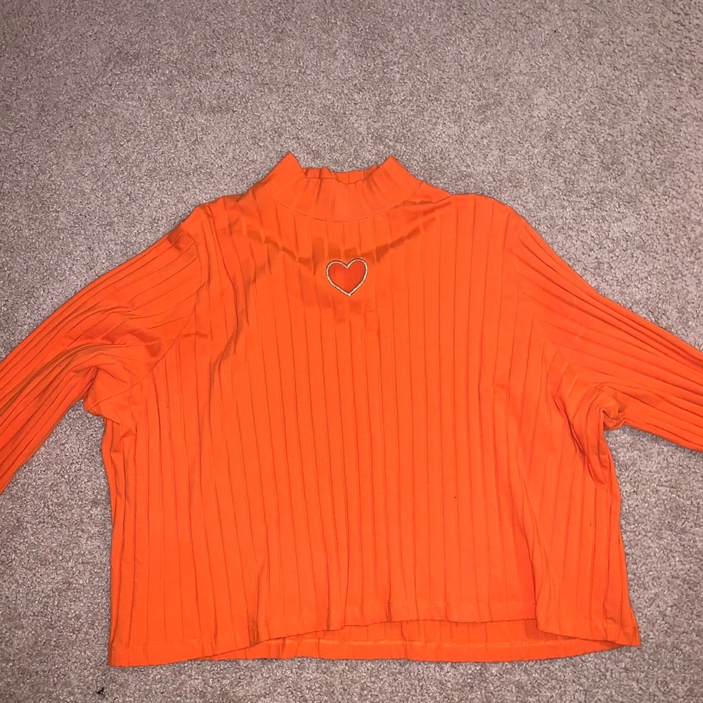 Heart cut out sweater from Dolls Kill